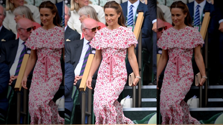 Pippa Middleton con un vestido floral rosa y un bolso de mano beige en Wimbledon en 2024.