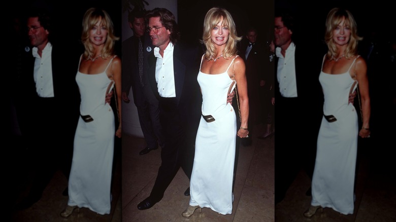 Goldie Hawn y Kurt Russell en la alfombra roja en 1996