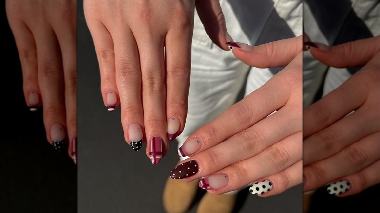 Uñas con nail art y pedrería.